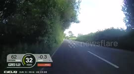 Speeding Porsche Overtakes Cyclist