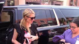 Paris Hilton is seen out and about as she grabs some food and hangs out in Beverly Hills, Ca