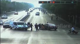 Police and good samaritans rescue young cyclist trapped under car