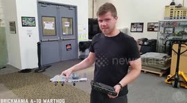 Guy fails to get Lego plane fly