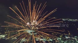 Drone flies through fireworks