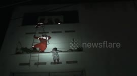 Firefighters rescue boy stuck on a balcony