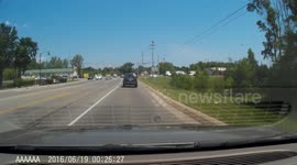 Close call - car almost hits two vehicles - dash cam