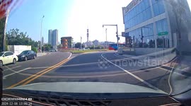 Motorcycle crashes into flowerbed and flips over in Guangdong, China