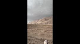 Duststorm approaches tractor in Santiago del Estero, Argentina