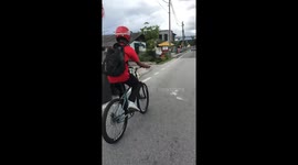 Bicycle wheelie attempt ends in a fall in Ampang, Malaysia