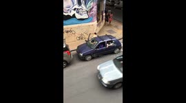 Crowd emerges from Renault Clio in Córdoba, Argentina