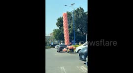 Vendor's create sales tactic goes viral in China: Skyscraper of pig balloons