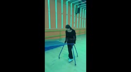Newbie roller skater uses training device in China