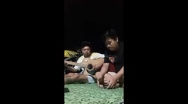 Snake appears as two friends record themselves singing in garden