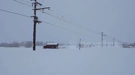 Snow Plough Train Battles Heavy Snowfall to Clear Tracks in Japan
