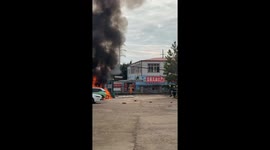 Firemen tackle electric car fire in China