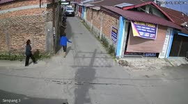 Wall collapses killing two pedestrians in Indonesia