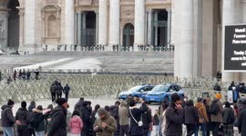 Two police patrols guard St. Peter's Square the day before the start of the Jubilee in Vatican City.