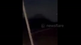 Drone over Albany with bizarre flashing light.