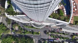 Window cleaners in Santa Claus outfits abseil down skyscraper