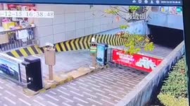 Electric SUV speeds out of garage, smashes through barrier and wrecks parked car