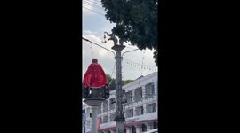 Monkey landmark decorated with Christmas cape in Thailand