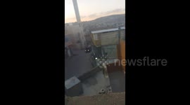 West Bank: Israeli forces arrest a Palestinian youth during their raid on the town of Beit Furik, east of Nablus, in the West Bank