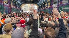 Hundreds of people bid at Smithfield Market Christmas Eve Meat Auction 2024 in London