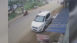 India: Hair-raising escape: woman dodges overturning car as shawl gets snatched in crash!