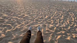 China: A First-Person Perspective of Swinging on a Beach Swing.