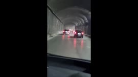 Traffic inside a road tunnel caught on the dashboard camera