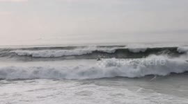 US: Extreme Wave Pounds Pacific Coast, Surfers Chase Massive Swells