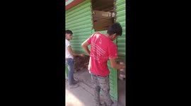 Coworker slightly injured by metal roll-up door in Tláhuac, Mexico