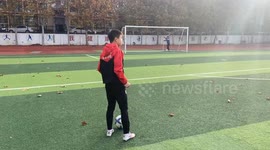 Ball hits post and keeper's head in Hebei Province, China