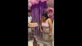 Cake pushed into person's face at birthday in Buenos Aires