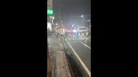 Dog displays impeccable pedestrian etiquette on a busy road in Marikina, Philippines