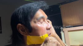 Elvis lookalike reveals secret to young looks is Sellotaping his face