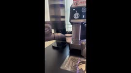 Robot barista makes perfect coffee latte art