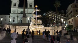 The lights of the Bulgari tree installed on the Spanish Steps on Christmas Eve in Rome.