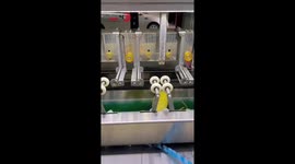 Satisfying footage shows automatic machines performing factory processes