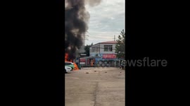 China: Fire Fighters Put out Fire of Burning Cars