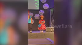 Little girl steals show at pre-school Christmas recital