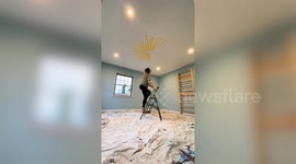 Muralist transforms nursery into circus tent-themed playroom