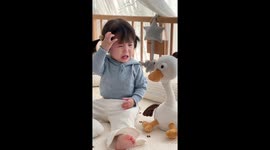 Unexpected tears: Chinese toddler startled by interactive toy
