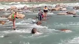 Trio stranded in strong river currents brought to safety by relief workers