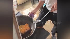 Man decides to fry up and eat his pet fish after it suddenly died