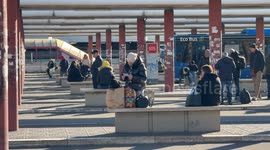 Travelers departing from the Rome Anagnina suburban bus station in Rome.