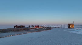 Time-honored winter fishing tradition preserved at China's Chagan Lake
