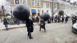 Two Morris Dancers performing outside a South London Pub