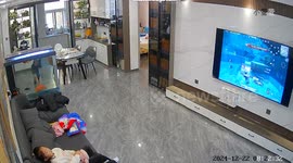 Child breaks TV with broom in Henan province