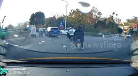 Motorbike collision caused by sudden car door opening in Zhejiang Province