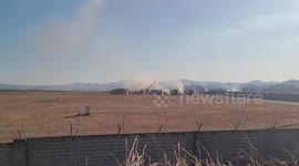 Emergency crews attend South Korea plane crash