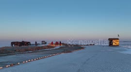 Traditional ice-fishing spectacle captivates tourists