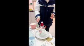 Chinese woman repurposes glass bottles into creative vases